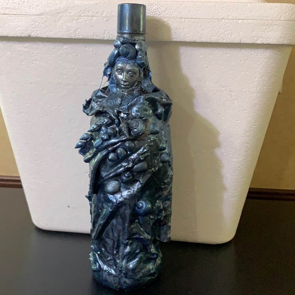 Upcycled altered, sculpted bottled